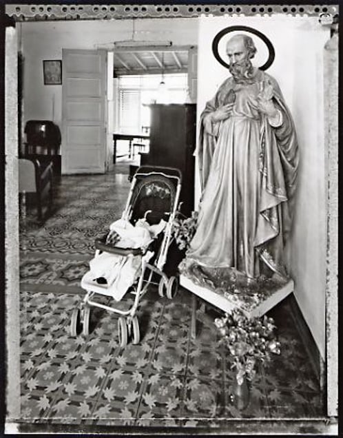 Baby Carriage and the Saint, Trinidad, 2002. © Elaine Ling