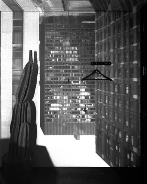Camera Obscura Image of Three Buildings in Room with Cactus, LaSalle Bank, Chicago, IL, 2005 © Abelardo Morell