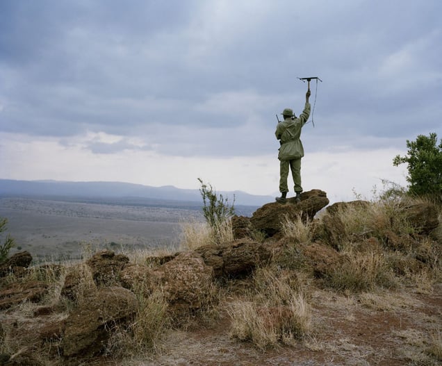 monitoring lion, lewa conservancy, northern kenya-from the series 'with butterflies and warriors'-David Chancellor