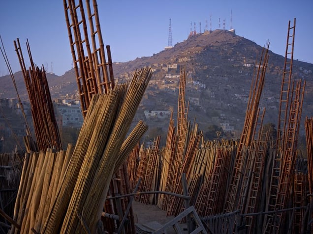 Yards supplying construction materials in the Nawabadi Guzargah district of Kabul, overlooked by American-controlled electronic eavesdropping equipment on the summit of Kohe Asmai.
© Simon Norfolk.