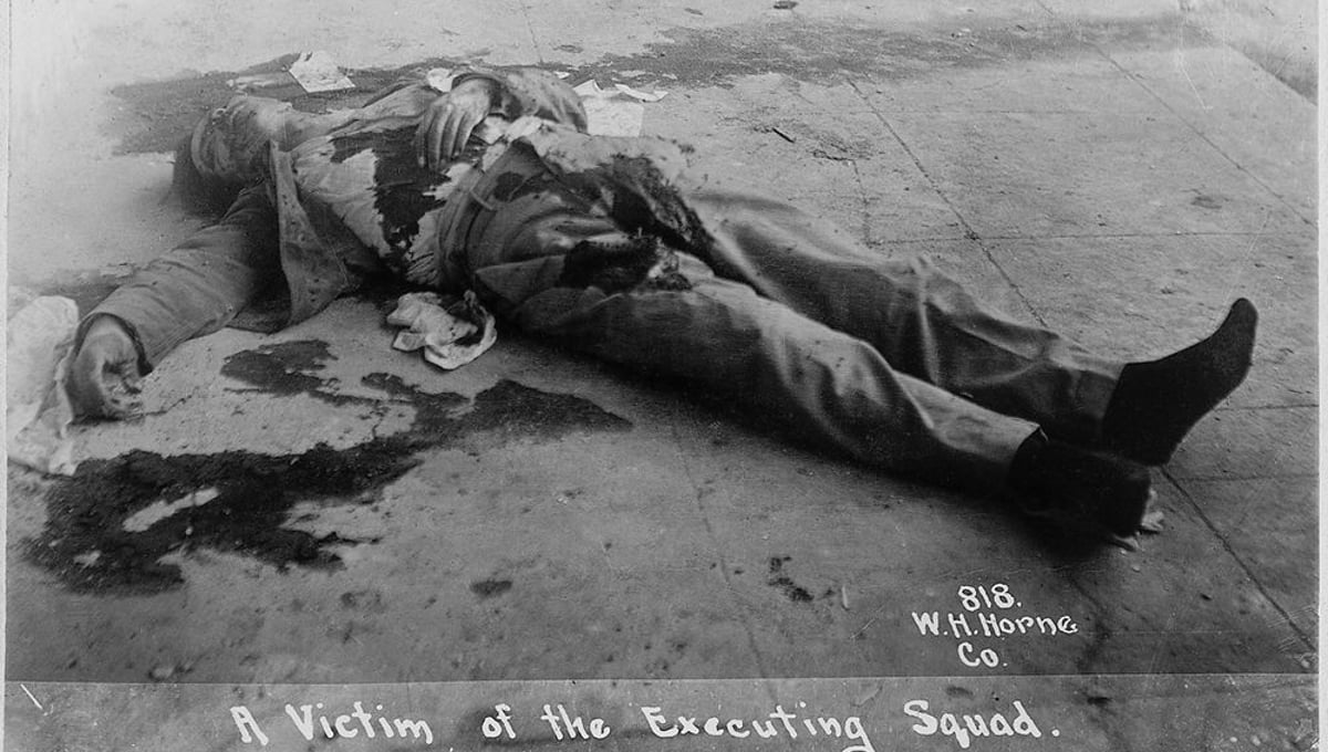 © Walter H. Horne, A Victim of the Executing Squad, 1913. Photograph postcard. Research Library, The Getty Research Institute, Los Angeles.