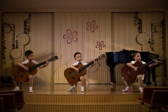 Children perform at the Pyongyang Kyongsang Kindergarten in Pyongyang,North Korea, 20 May 2015.