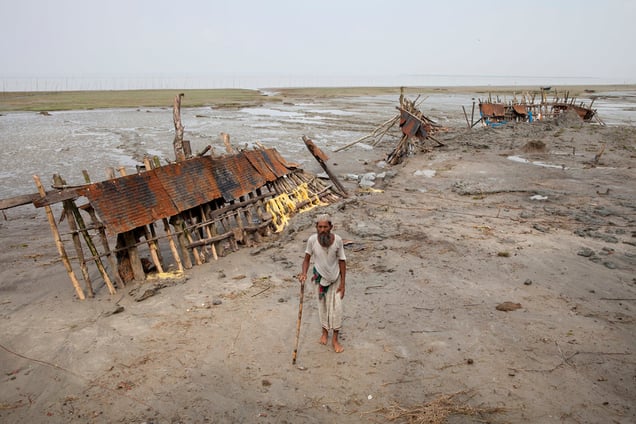 Rustam Ahmed (age 70) is a villager of Patharghata who has lost his land by river erosion. Barguna, Bangladesh