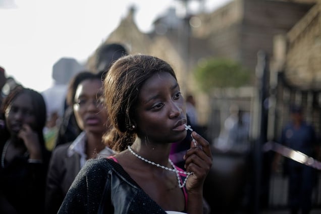1st Prize People – Observed Portraits Single. A woman reacts in disappointment after access to see former South Africa President Nelson Mandela was closed on the third and final day of his casket lying in state, outside Union Buildings in Pretoria, South Africa © Markus Schreiber, Germany, The Associated Press