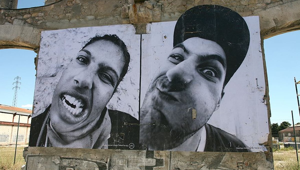 Installation view of JRÃ¢â?¬â?¢s work shown in Arles, France, 2007. © jr