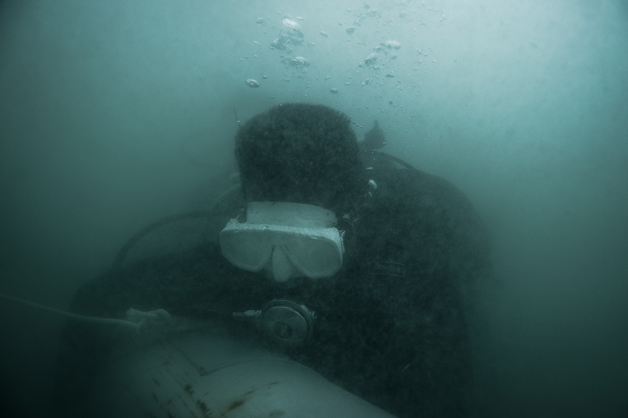 DARK WATER: Cambodia's UXO Divers