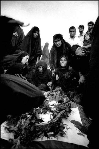 In Abadan cemetery, weeping mothers mourn the loss of their sons during the Iraqi bombardment  1981
© Copyright 1979-2009 Alfred Yaghobzadeh. All rights reserved.