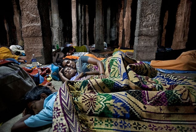 Hampi, India: During the traditional religious festival countless pilgrims sleep in the Virupaksha Temple. © Matjaz Krivic