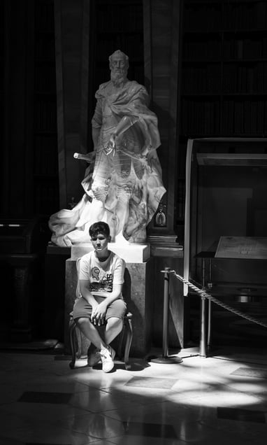 Bored Boy and Statue