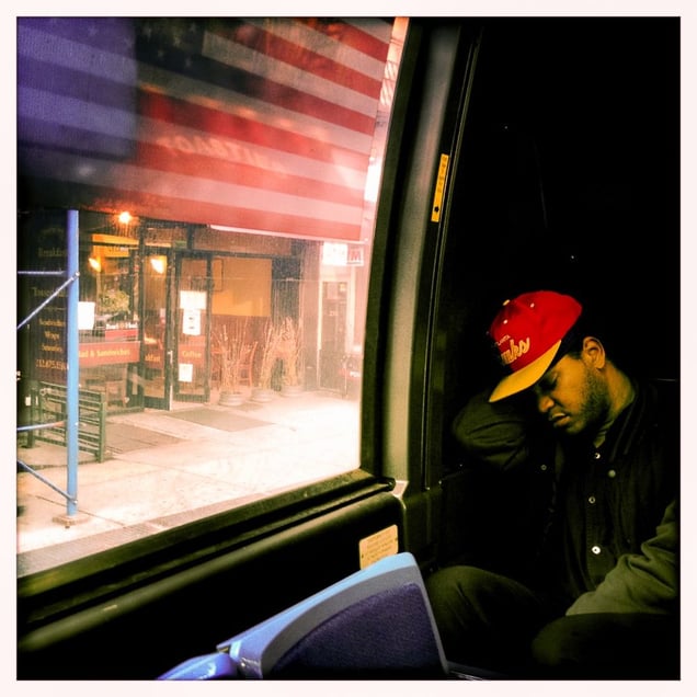 Asleep on the downtown bus, New York, NY