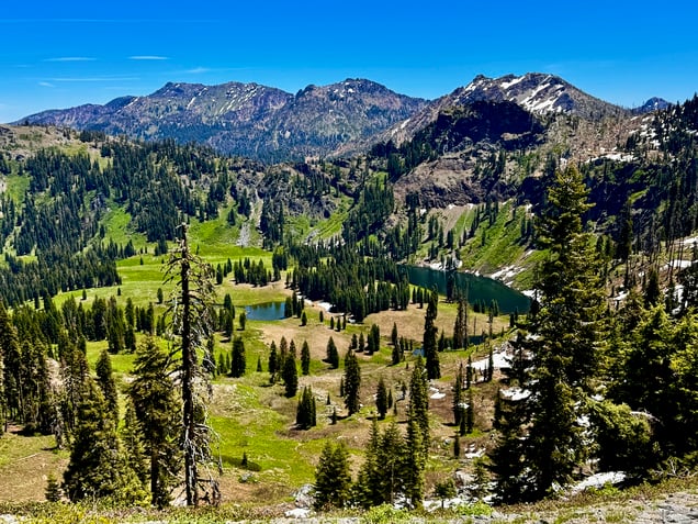 The Sky High Lakes below with the Red Mountain group of Peaks on the skyline. Boulder Peak on the far left is the highest summit in the Marble Mountains at 8,299 feet IMG_0747