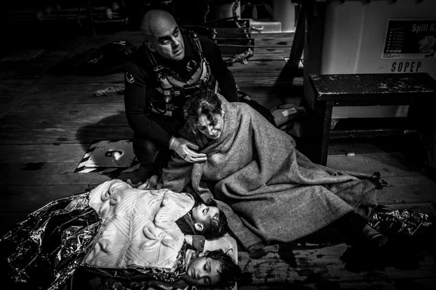 Syrian mother with her two drowned children onboard a rescue ship in the Aegean