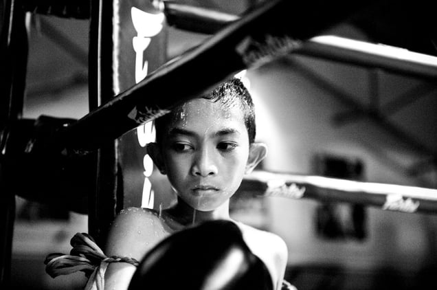 Boy in a boxing ring. © Sandra Hoyn