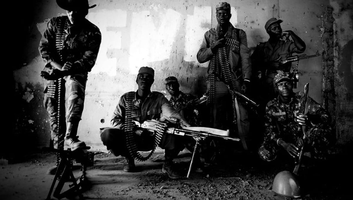 © Marco Vernaschi (Italy) The team of soldiers who executed the President, photographed seven hours after they accomplished their task, in the Military Headquarters in Bissau.  Grand Prize Winner, Portfolio Category, LensCulture Exposure Awards 2009