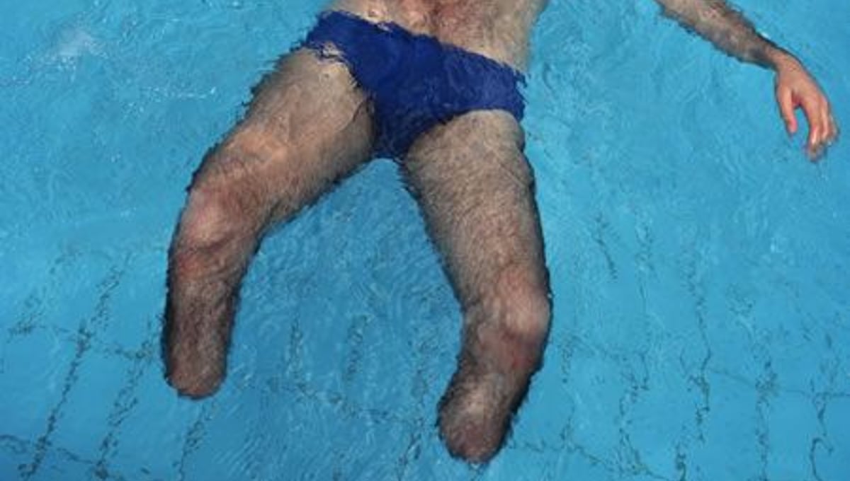 Dani Shimoni in the pool at Beit Halochem, Warrior’s Home, in Tel Aviv, Israel, 1995 Born: 1960, Served: Israeli Defense Forces, Conflict: Israeli Invasion of Lebanon 1982-85. © Lori Grinker, courtesy of Nailya Alexander Gallery
