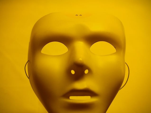 Yellow mask and yellow plastic tablecloth