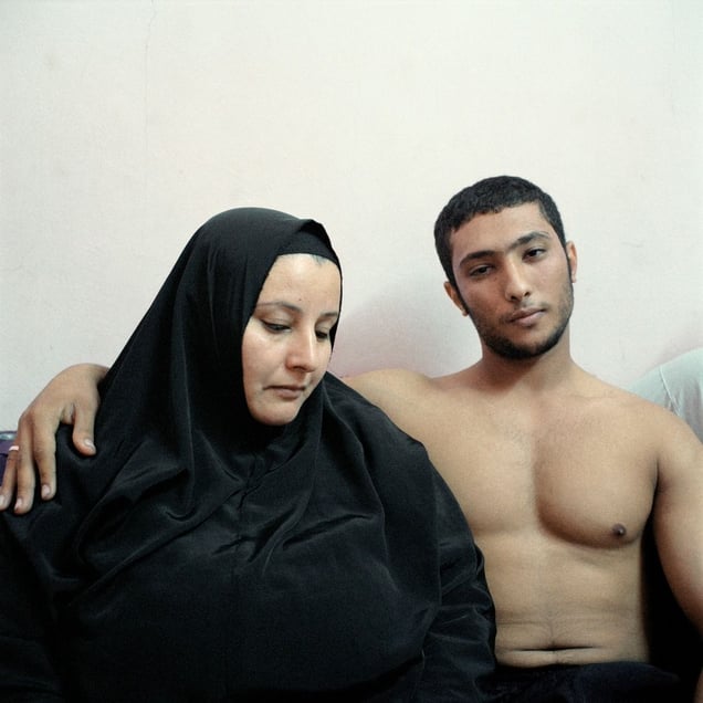 2nd Prize People – Staged Portraits Stories. Ali, a young Egyptian bodybuilder, poses with his mother © Denis Dailleux, France, Agence Vu