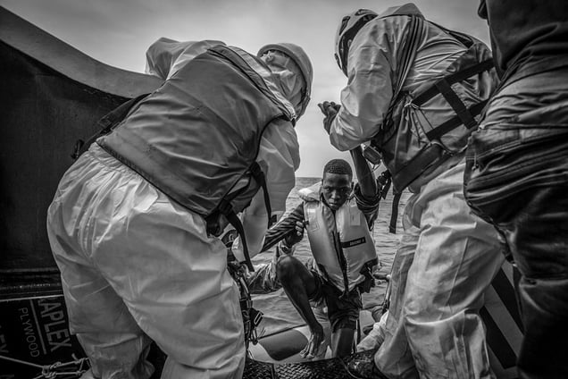 Migrant pulled to safety