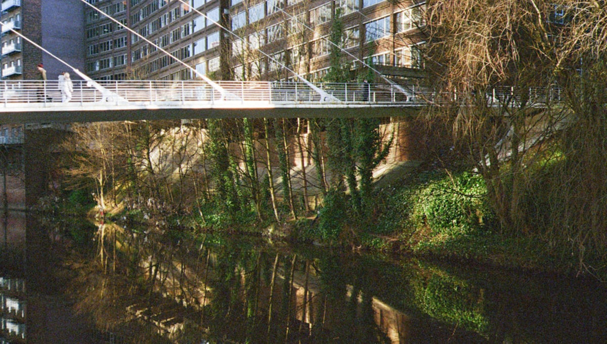 Reflections in the River Irwell between Manchester and Salford UK
