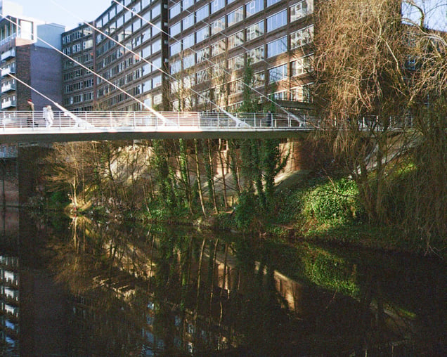 Reflections in the River Irwell between Manchester and Salford UK