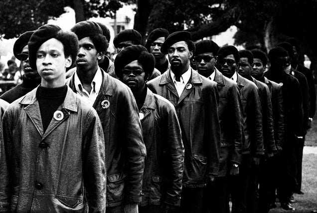 July 28, 1968 - Oakland, California, USA: "Panthers on Parade" Panthers line up at a Free Huey rally in DeFremery Park, in west Oakland’s ghetto. Light skinned man is Gregory Harrison. His brother, Oleander, went to Sacramento with Bobby Seale.