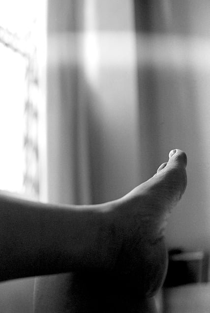 Quietly I sit by the window
