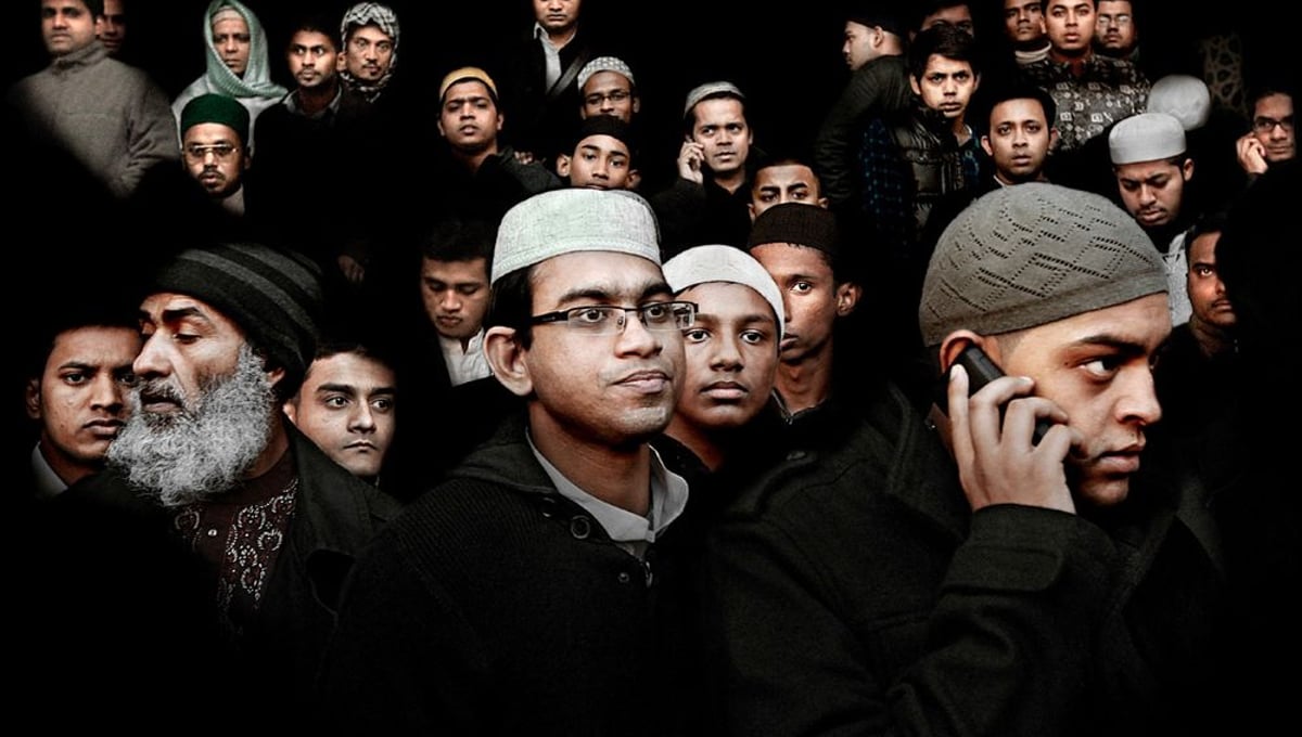 UK. London. 2010. Community members leave the East London Mosque after Eid prayers in London. Combined with the adjoining London Muslim Centre, it is one of the largest mosques in the United Kingdom. © Bharat Choudhary