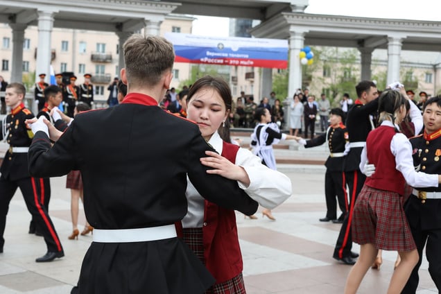 Students from military training schools dance during a patriotism-themed event at Lenin Square in Ulan-Ude, Republic of Buryatia on May 16, 2024.