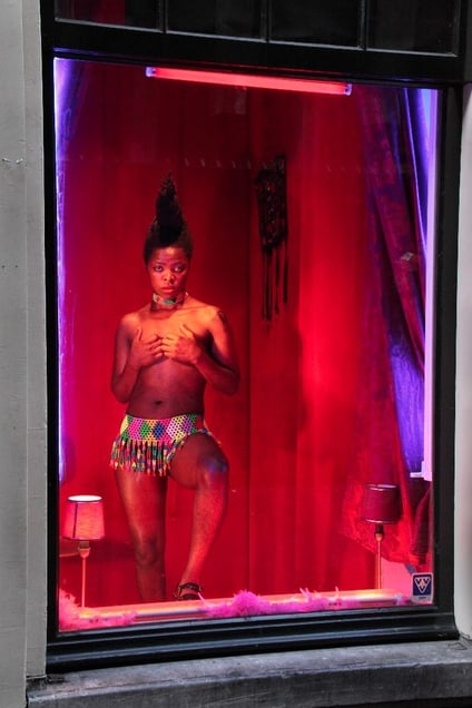 Documentation of intervention, Red Light District, Amsterdam. From the series "Being (T)here" © Zanele Muholi, courtesy of Huis Marseille