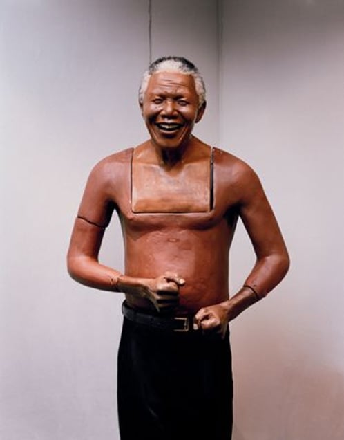 For most of the 27 years Nelson Mandela was in jail, his image was banned. Today, Mandela is everywhere. He is pillowcase and wristwatch; shebeen decoration and commemorative statue. His image is so powerful, it is again policed: reproduction requires permission from the Ministry of Trade and Industry. This Mandela model lives in the small museum at Caesar’s Palace Casino outside Johannesburg.
