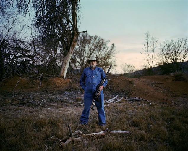 baboon hunter # II, at dusk eastern cape south africa-from the series 'hunters'-David Chancellor