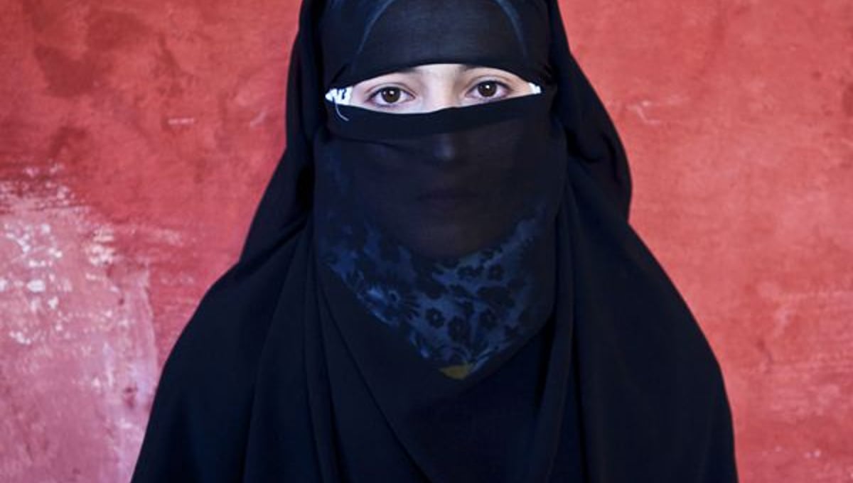 Jdeideh, Lebanon. Rabiah, 15 years old, comes from the village of Zahra. She arrived in Lebanon almost three months ago, together with her family. A 9th grade student, she already lost one year at school because of the uprising. She constantly has nightmares, where she dreams of bullets chasing her while she tries to run away. "I wake up crying and screaming," she says. © Matilde Gattoni
