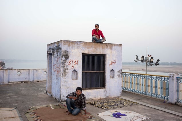 Shalu and Vivek on their house rooftop. Shalu is the second eldest son of the Dom Raja and works in Manikarnika.