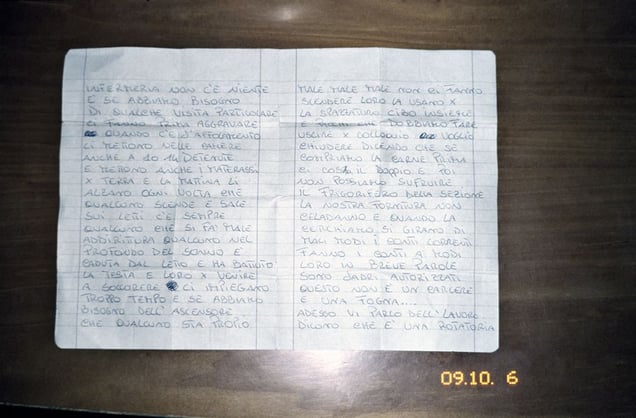 Pozzuoli, Naples.
Letter of a woman detained in the female prison in Pozzuoli. In the letter she describes the conditions on the inside; in a cell with room for 4 beds, there are 14 mattresses on the floor, people sleep on top of each other, guards don't deliver money that relatives bring for the prisoners and the pasta has worms in it.
© Valerio Spada.