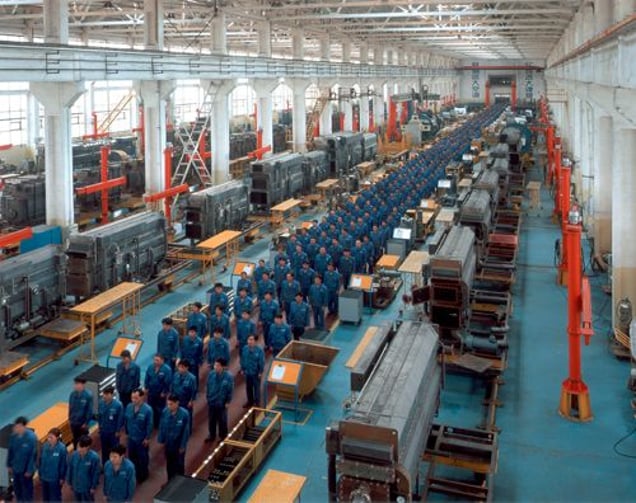 1st prize Contemporary Issues Stories © Michael Wolf, Germany, Laif Photos & Reportagen for Stern Magazine, China: factory for the world. In recent years China has grown to become the world’s fifth largest exporter of merchandise, and has one of the world's fastest growing economies. A huge influx of migrant workers is required to meet demand in city factories.