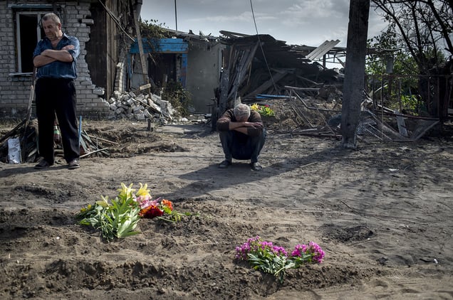 A citizens in the village of Luhanskaya after the air attack