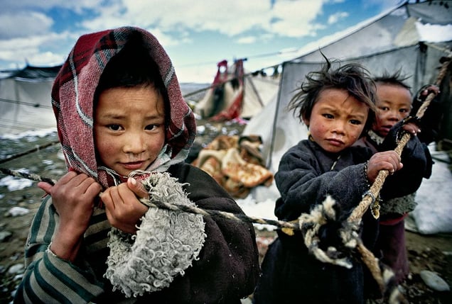 Darchen, Tibet: Tibetan children whose parents went on a pilgrimage around holy Mount Kailash in Western Tibet. © Matjaz Krivic