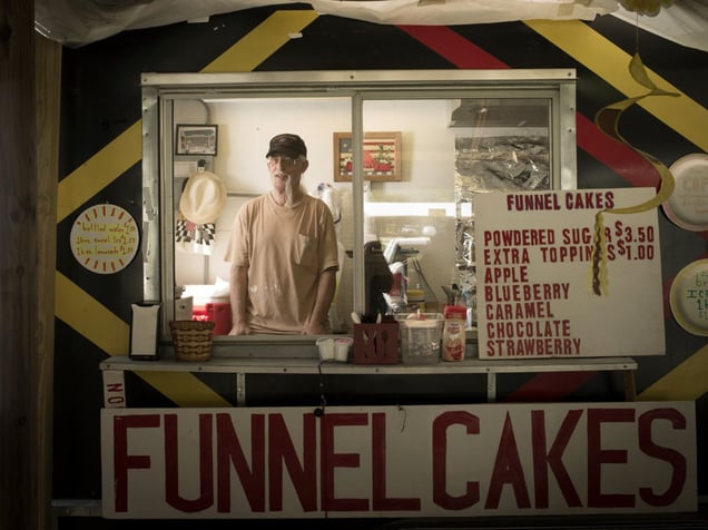 Rick Tardo worked 25 years in construction before opening his snack shop 5 years ago. He's been at Uncle Bill's Flea Market in Whittier, NC for the last 2 years. © Forest McMullin