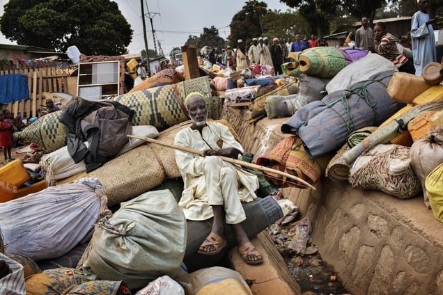 Muslims waiting for trucks at PK12 after fleeing their homes. Christian anti-balaka forces were systematically attacking Muslim communities in the region. January 23, 2014. © Marcus Bleasdale / Human Rights Watch / National Geographic Magazine