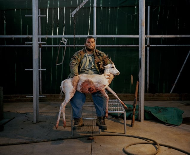 2610.49 002bloodied hunter with white springbok # I, south africa-from the series 'hunters'-David Chancellor