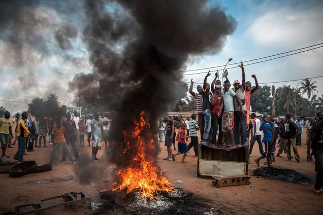 2nd Prize General News Stories. Demonstrators gather on a street in Bangui to call for the resignation of interim President Michel Djotodia following the murder of Judge Modeste Martineau Bria by members of Seleka. The UN has warned of a potential slide into genocide and the conflict is ringing alarm bells across the continent and beyond © William Daniels, France, Panos Pictures for Time