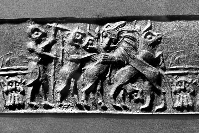 Hero attacking felines menacing horned animals