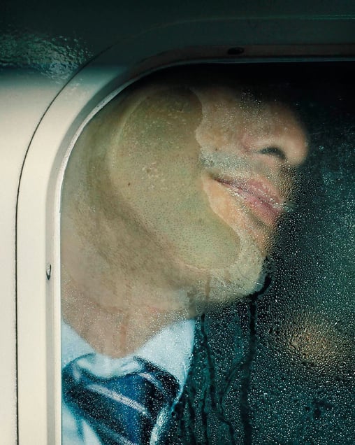From the series "Tokyo Compression," a series of candid portraits of Japanese commuters enduring the inhuman daily crush of bodies in Tokyo’s subway cars.