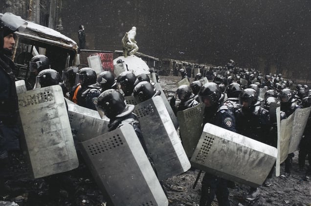 Riot police returned to their former positions leaving the area near Lobonovskogo stadium after the crackdown of protesters in the center of Kiev on Jan. 22, 2014.