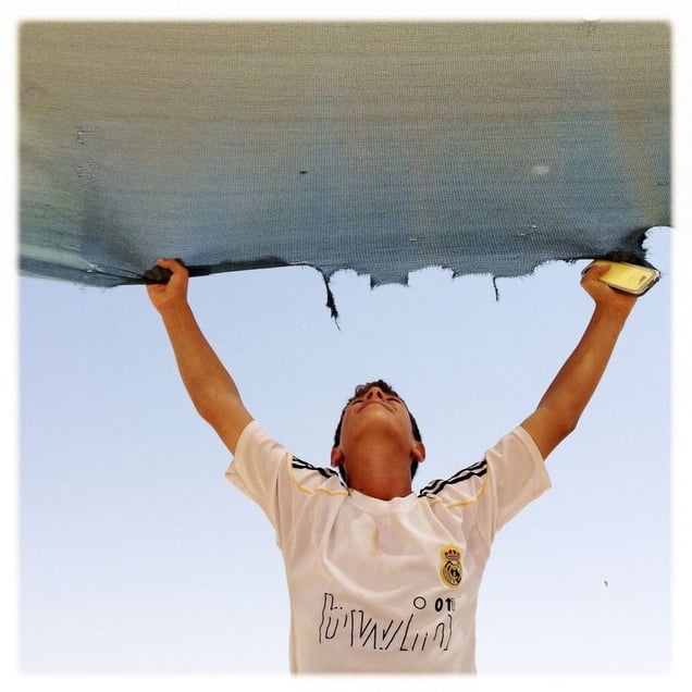 iPhone photography assingment with teenagers in Za'atari, Jordan