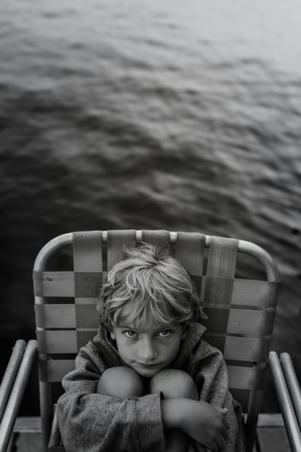 Yellow Chair on Blue Water