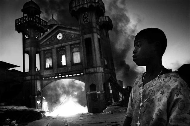 1st Prize General News Single © Riccardo Venturi, Italy, Contrasto. Old Iron Market burns, Port-au-Prince, Haiti, 18 January