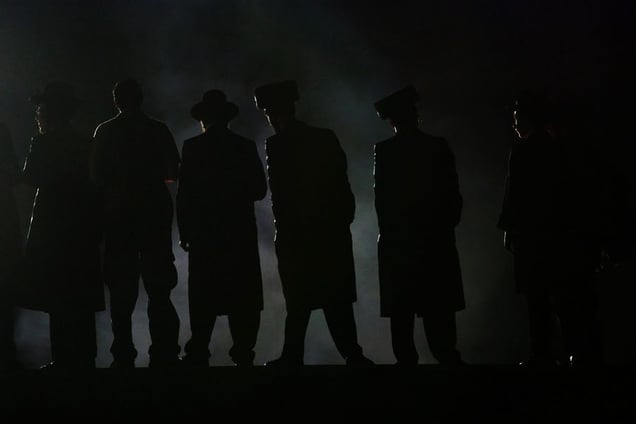 Mt. Meiron, May 04 - Ultra-Orthodox Jews watching the main fire during Lag BaOmer celebration © Natan Dvir