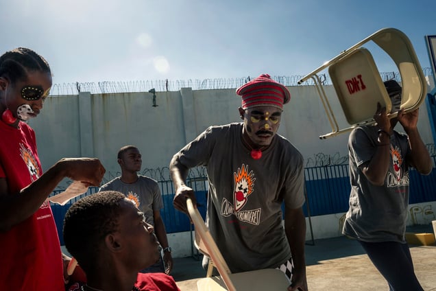 The C.E.R.M.I.C.O.L. (a rehabilitation center for young people in trouble with the law) was razed during the earthquake, killing most of the young people in care there. Today it has been rebuilt, hosting 110 young people. During World Childhood Day, on November 20, 2014, Terre Des Homes Italia and Clowns Sans Frontieres organised workshops and performances for the detainees.