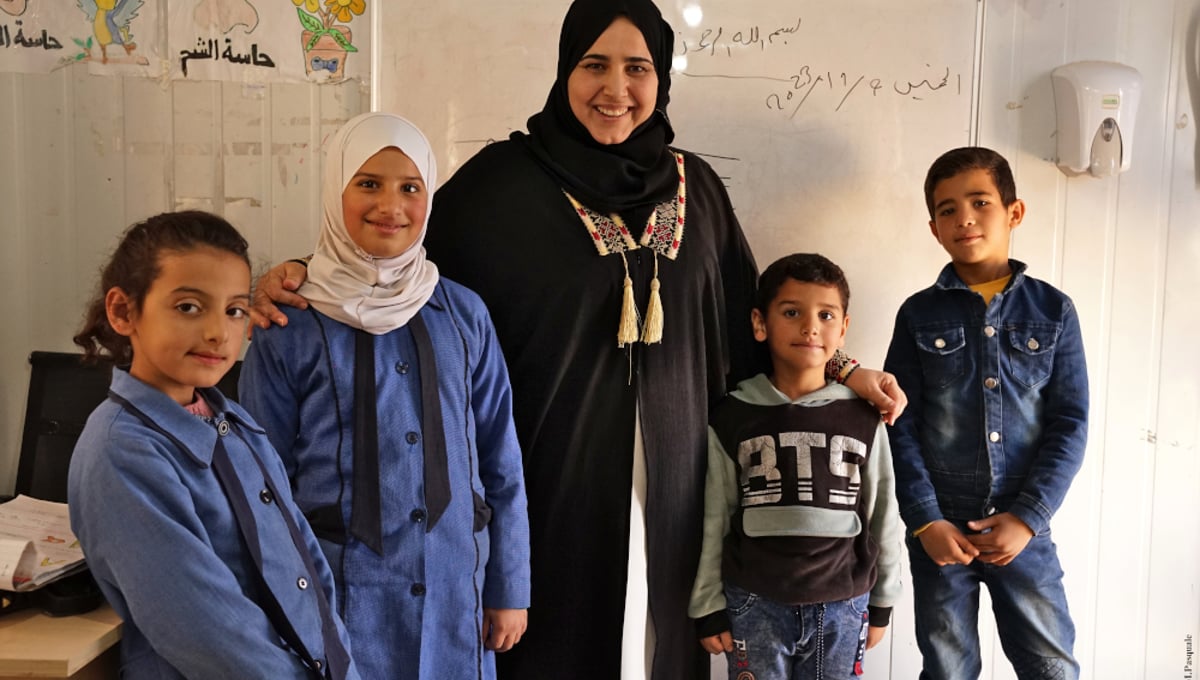 The class of students with their teacher